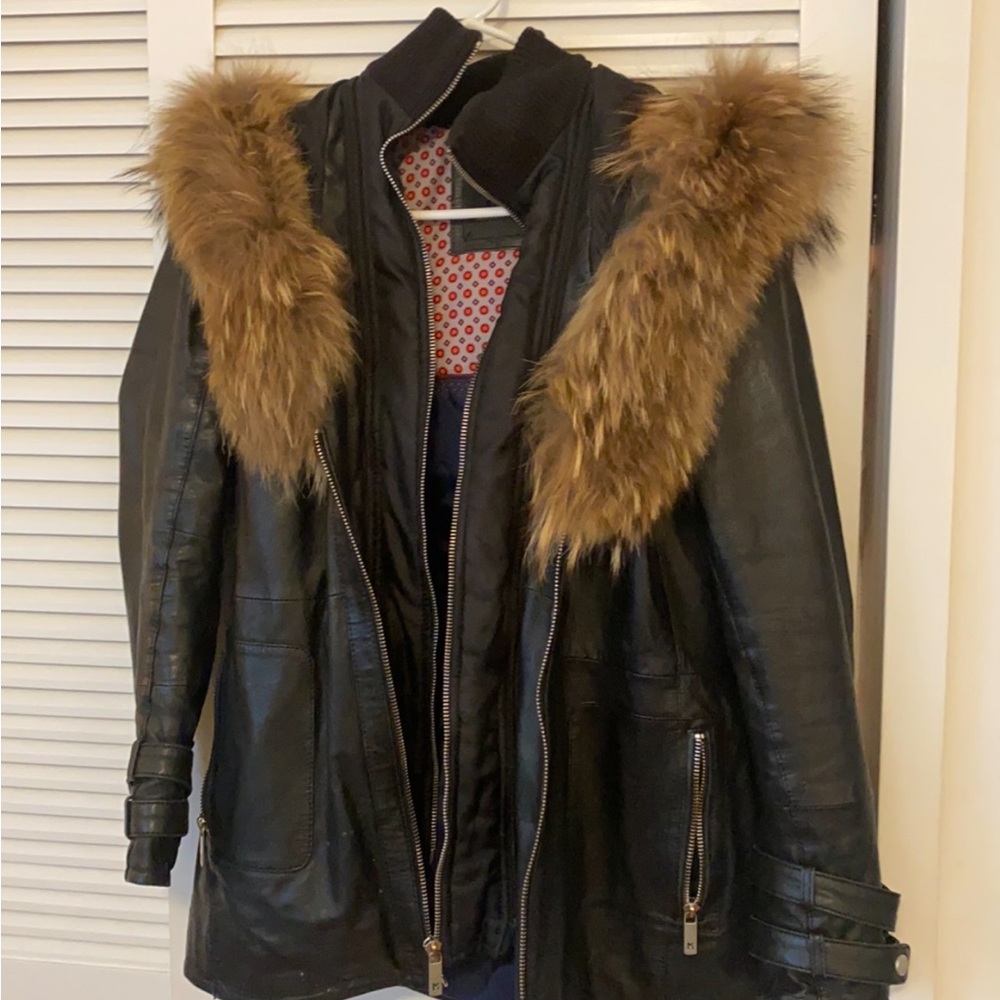 Genuine Leather coat with lining.
